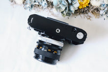 Load image into Gallery viewer, 📸Canon A-1 + FD 50mm f1.4 S.S.C✨ 初心者さんもOK!多彩な撮影モードで楽しめる名機セット