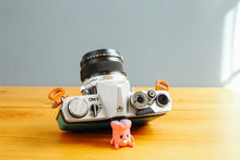 ç»åãã®ã£ã©ãªãŒãã¥ãŒã¢ã«èªã¿èŸŒã, OLYMPUS OM-1 èŒã®æç©ºðãå®ååã