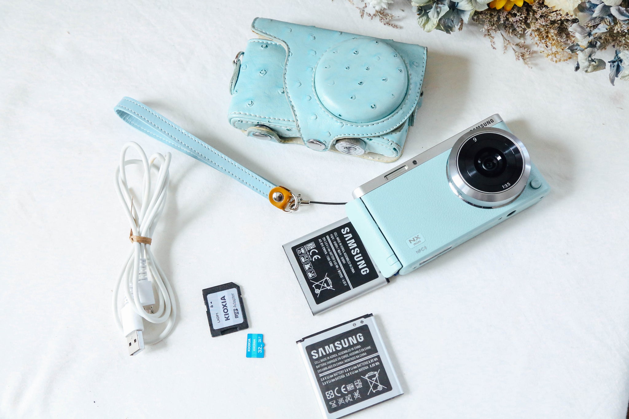 Samsung NX mini ミントブルー｜広角単焦点・Wi-Fi搭載・自撮りOKの
