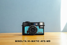 Load image into Gallery viewer, Minolta Hi-matic AF2-MD Ice Blue ❄️ [In working order]
