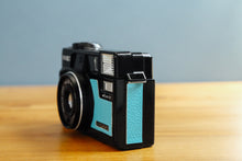 Load image into Gallery viewer, Minolta Hi-matic AF2-MD Ice Blue ❄️ [In working order]
